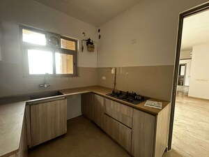 Kitchen in 2 BHK Apartment at Hiranandani Estate Rodas Enclave, Ghodbunder Road – for Rent