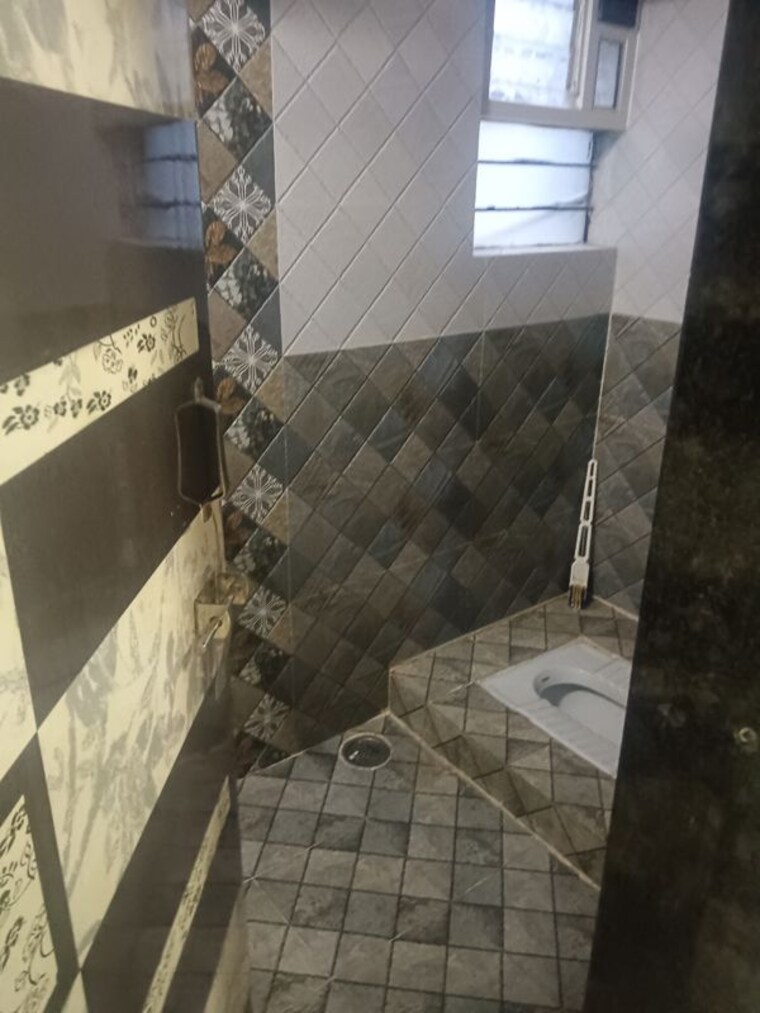 Bathroom, shantiban-chsl 2 Bedroom 910 Sq.Ft. Apartment In Vishrantwadi Pune 10021494