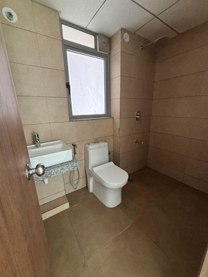Bathroom in 1 BHK Apartment at Kalpataru Immensa, Kolshet Road – for Rent