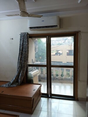 Living Room in 2 BHK Apartment at Siddhachal Phase 5 CHS Ltd, Vasant Vihar – for Rent