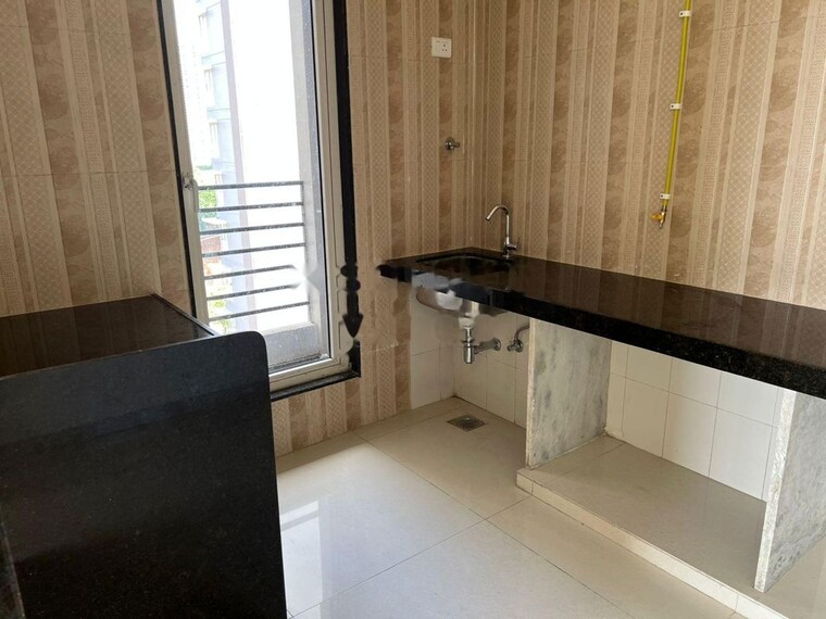 Kitchen, sheth-zuri 2 Bedroom 517 Sq.Ft. Apartment In Laxmi Nagar Thane 10021545