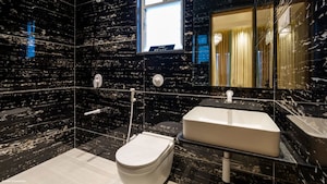 Bathroom in 2 BHK Apartment at Unique K City, Keshav Nagar – for Sale