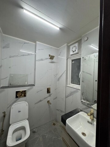 Bathroom in 3 BHK Apartment at Smart World Orchard, Sector 61 – for Rent