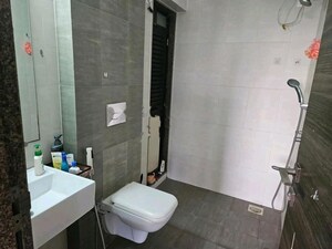 Bathroom in 2 BHK Apartment at Kanakia Rainforest, Andheri East – for Sale