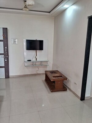 Living Room in 1 BHK Apartment at Agarwal Vrindavan Gardens, Nalasopara East – for Rent