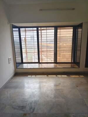 Room in 2 BHK Apartment at Atul Blue Horizon II, Malad West – for Rent