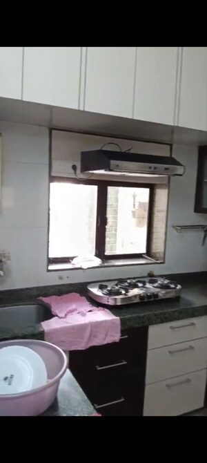 Kitchen in 2 BHK Apartment at Takshila CHS, Andheri East – for Rent