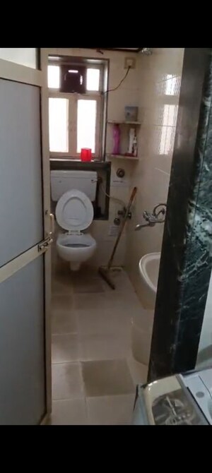 Bathroom in 2 BHK Apartment at Takshila CHS, Andheri East – for Rent