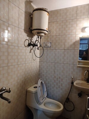 Bathroom in 1 RK Apartment at Varun Enclave, Sector 28 – for Rent