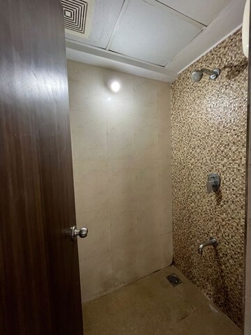 Bathroom in 1 BHK Apartment at Lodha Downtown, Dombivli East – for Rent