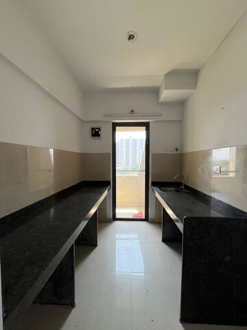 Kitchen in 1 BHK Apartment at Lodha Downtown, Dombivli East – for Rent