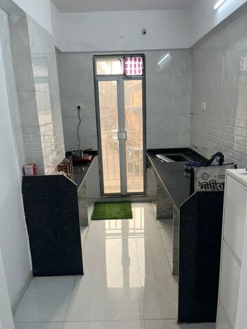 Kitchen in 2 BHK Apartment at Someshwarnath Medhekar Heights, Waldhuni – for Sale