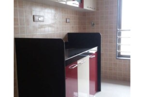 Kitchen in 2 BHK Apartment at LK Umang Heights, Andheri West – for Rent