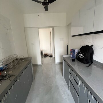 Kitchen in 2 BHK Apartment at Riddhi Rajendra Nagar Swagat CHS, Datta Pada – for Rent