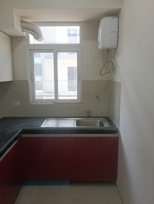 Kitchen in 2.5 BHK Apartment at Smart World Gems, Sector 89 – for Rent