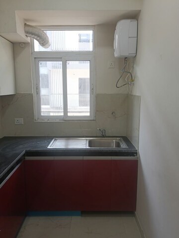 Kitchen in 2.5 BHK Apartment at Smart World Gems, Sector 89 – for Rent