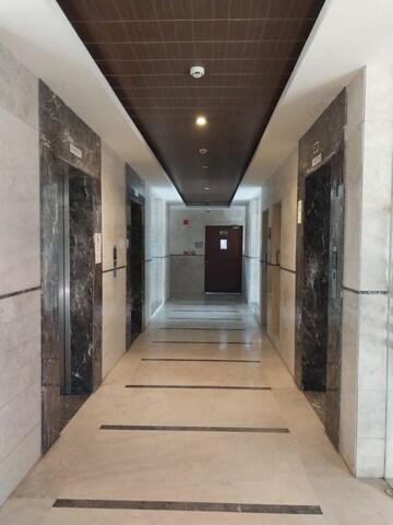 Building Lobby in 3.5 BHK Apartment at Adani M2K Oyster Grande, Sector 102 – for Sale