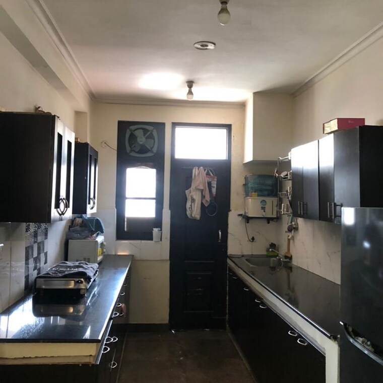 Kitchen, jaipurias-sunrise-greens-zirakpur 3 Bedroom 1747 Sq.Ft. Apartment In Vip Road Zirakpur 10022330