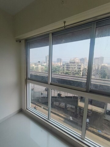 Balcony in 1 BHK Apartment at A And O Eminente Phase 2, Dahisar East – for Rent