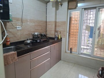 Kitchen in 2 BHK Apartment at Bhatia Esspee Towers, Borivali East – for Rent
