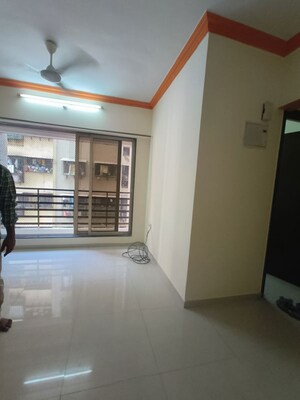 Living Room in 2 BHK Apartment at Bhatia Esspee Towers, Borivali East – for Rent