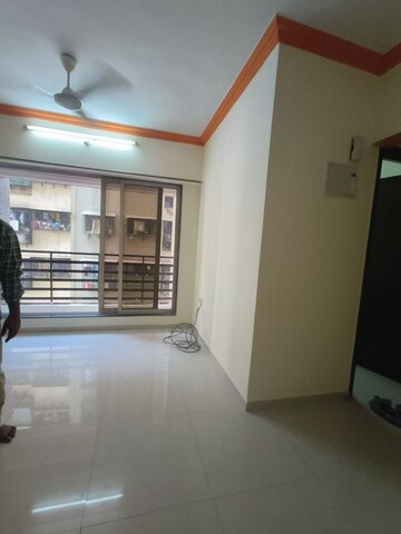 Living Room in 2 BHK Apartment at Bhatia Esspee Towers, Borivali East – for Rent