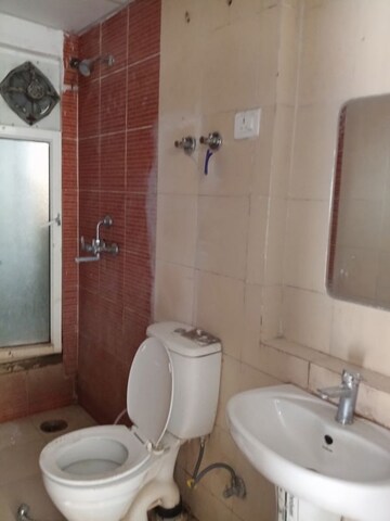 Bathroom in 3 BHK Apartment at Mahagun Mywoods III, Sector 16c Greater Noida – for Rent