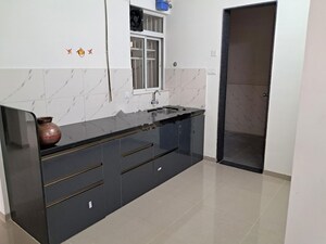 Kitchen in 2 BHK Apartment at Kolte Patil Life Republic 16th Avenue Arezo, Hinjewadi – for Rent