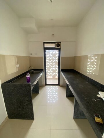 Kitchen in 1 BHK Apartment at Lodha Downtown, Dombivli East – for Rent