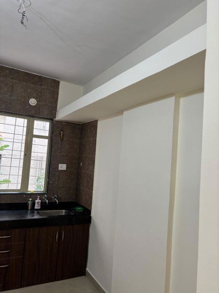 Kitchen, goel-ganga-gyanganga 2 Bedroom 800 Sq.Ft. Apartment In Rahatani Pune 10023360