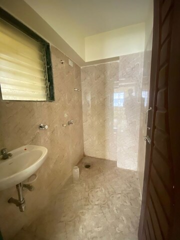 Bathroom in 1 BHK Apartment at Lodha Codename Golden Sunrise, Dombivli East – for Rent