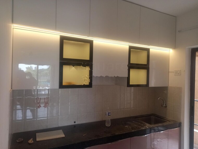 Kitchen, shapoorji-pallonji-joyville-hadapsar-annexe 2 Bedroom 850 Sq.Ft. Apartment In Hadapsar Pune 10023532