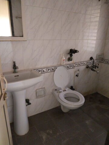 Bathroom in 2 BHK Apartment at K Raheja Palm Court, Malad West – for Rent