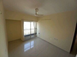 Room in 2 BHK Apartment at Rustomjee Azziano Wing K, Thane West – for Sale