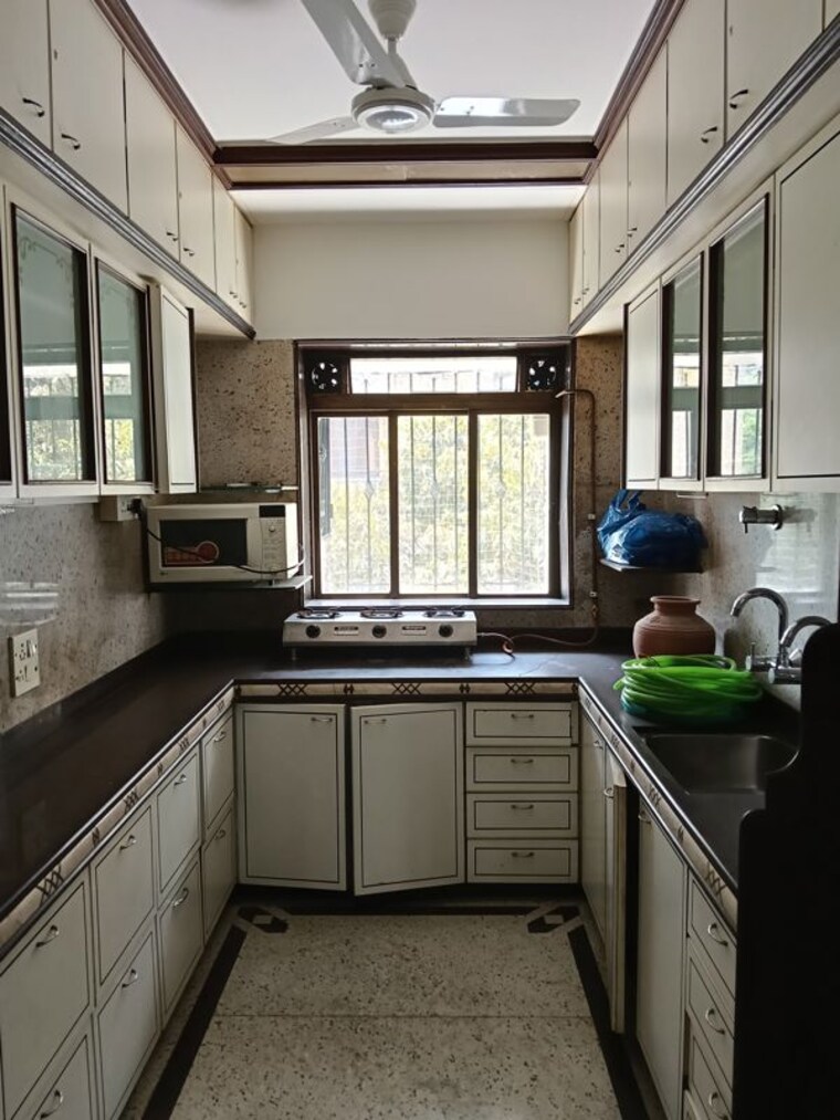 Kitchen, exclusive-apartment 2 Bedroom 850 Sq.Ft. Apartment In Santacruz West Mumbai 10024039