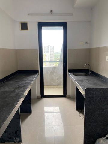 Kitchen in 1 BHK Apartment at Lodha Lakeshore Greens, Dombivli East – for Rent