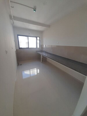 Kitchen in 2 BHK Apartment at Kumar Palmspring Towers, Undri – for Rent