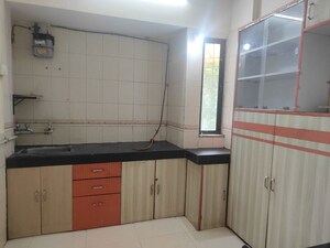 Kitchen in 1 BHK Apartment at Kanchan Pushp Society, Ghodbunder Road – for Rent