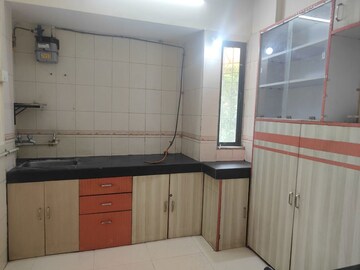 Kitchen in 1 BHK Apartment at Kanchan Pushp Society, Ghodbunder Road – for Rent