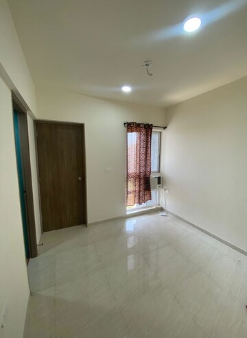 Living Room in 2 BHK Apartment at Lodha Codename Golden Sunrise, Dombivli East – for Rent