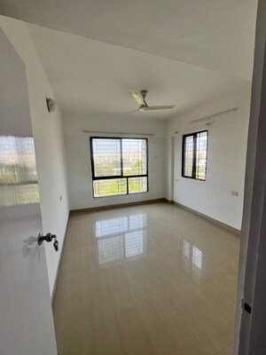 Room in 2.5 BHK Apartment at Mittal Brothers Whistling Palms, Wakad – for Rent