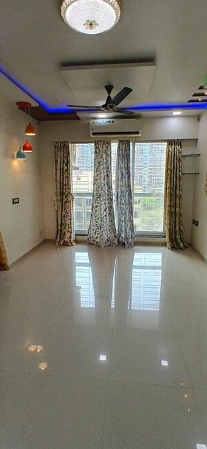Living Room in 2 BHK Apartment at Lokhandwala Octacrest, Kandivali East – for Rent