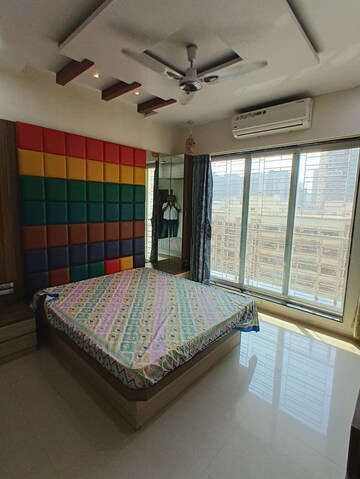 Bedroom in 2 BHK Apartment at Lokhandwala Octacrest, Kandivali East – for Rent
