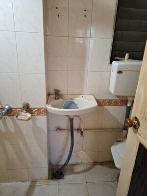 Bathroom in 2 BHK Apartment at Runwal Heights, Mulund West – for Rent