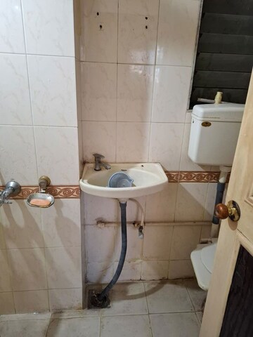 Bathroom in 2 BHK Apartment at Runwal Heights, Mulund West – for Rent