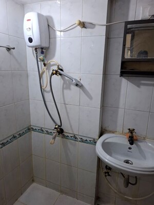 Bathroom in 2 BHK Apartment at Runwal Heights, Mulund West – for Rent