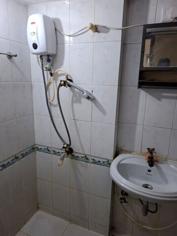 Bathroom in 2 BHK Apartment at Runwal Heights, Mulund West – for Rent