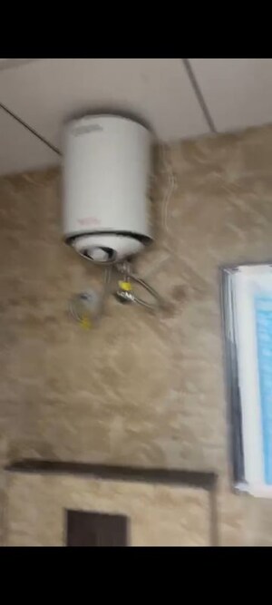 Bathroom in 2 BHK Apartment at Artique Uptown Skylla, International Airport Road – for Rent