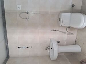 Bathroom in 4 BHK Apartment at Mittal Rajnagar Residency, Raj Nagar Extension – for Sale