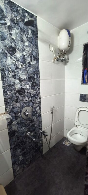 Bathroom in 2 BHK Apartment at Om Balaji Kripa CHS, Nerul Sector 19 – for Rent